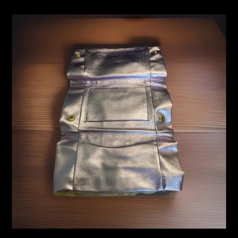 Versace Metallic Iridescent Silver Bow Clutch with Gold Plaque